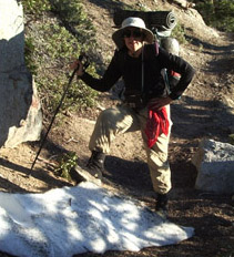 Monty poses at our First Snow patch on the PCT!